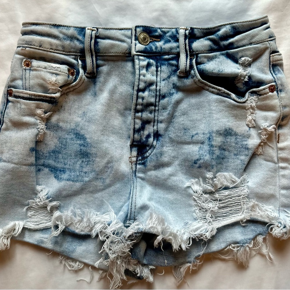 Blue High-Waisted Jean Shorts with Distressed Details